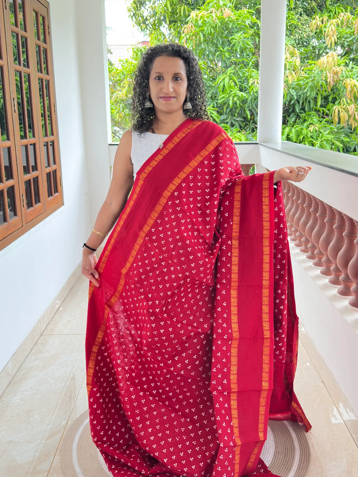 Red Wax Printed Madurai Sungudi Cotton Saree with Peacock Gap Border
